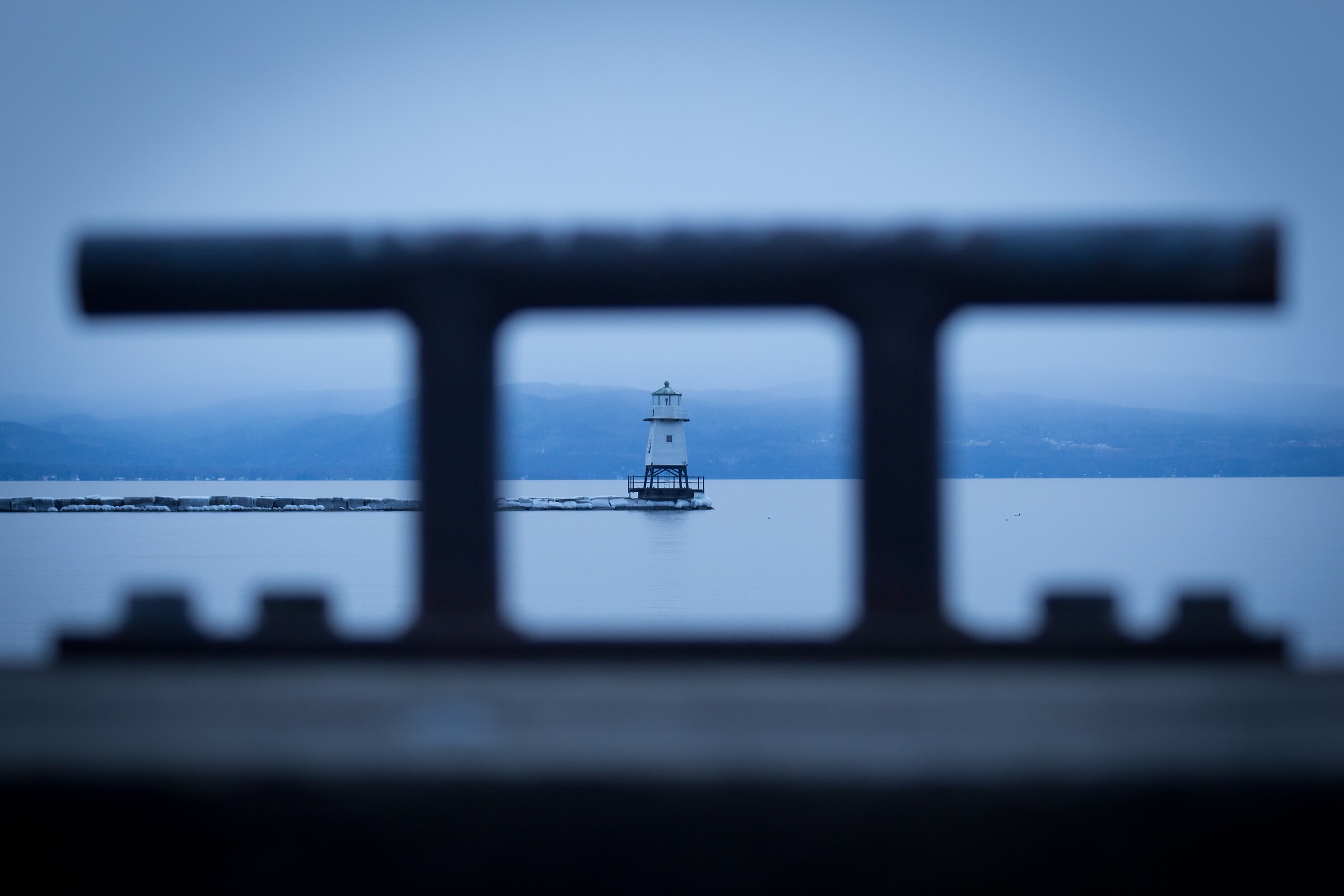Lighthouse through Cleat in Winter